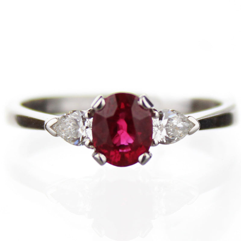 18W OVAL RUBY 0.88CT & DIAMOND 0.28CT TRILOGY RING